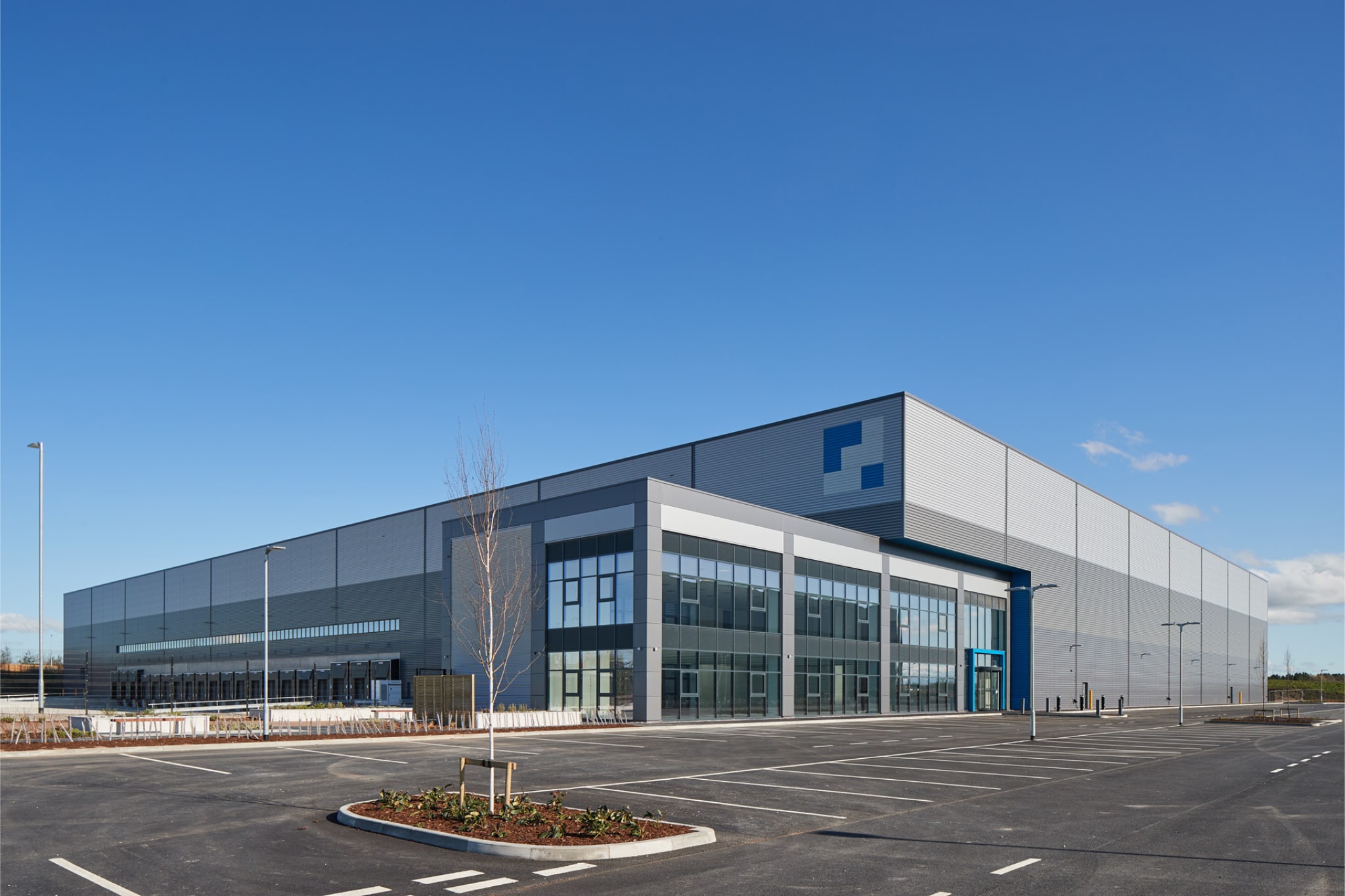 omega warrington industrial estate with blue skies