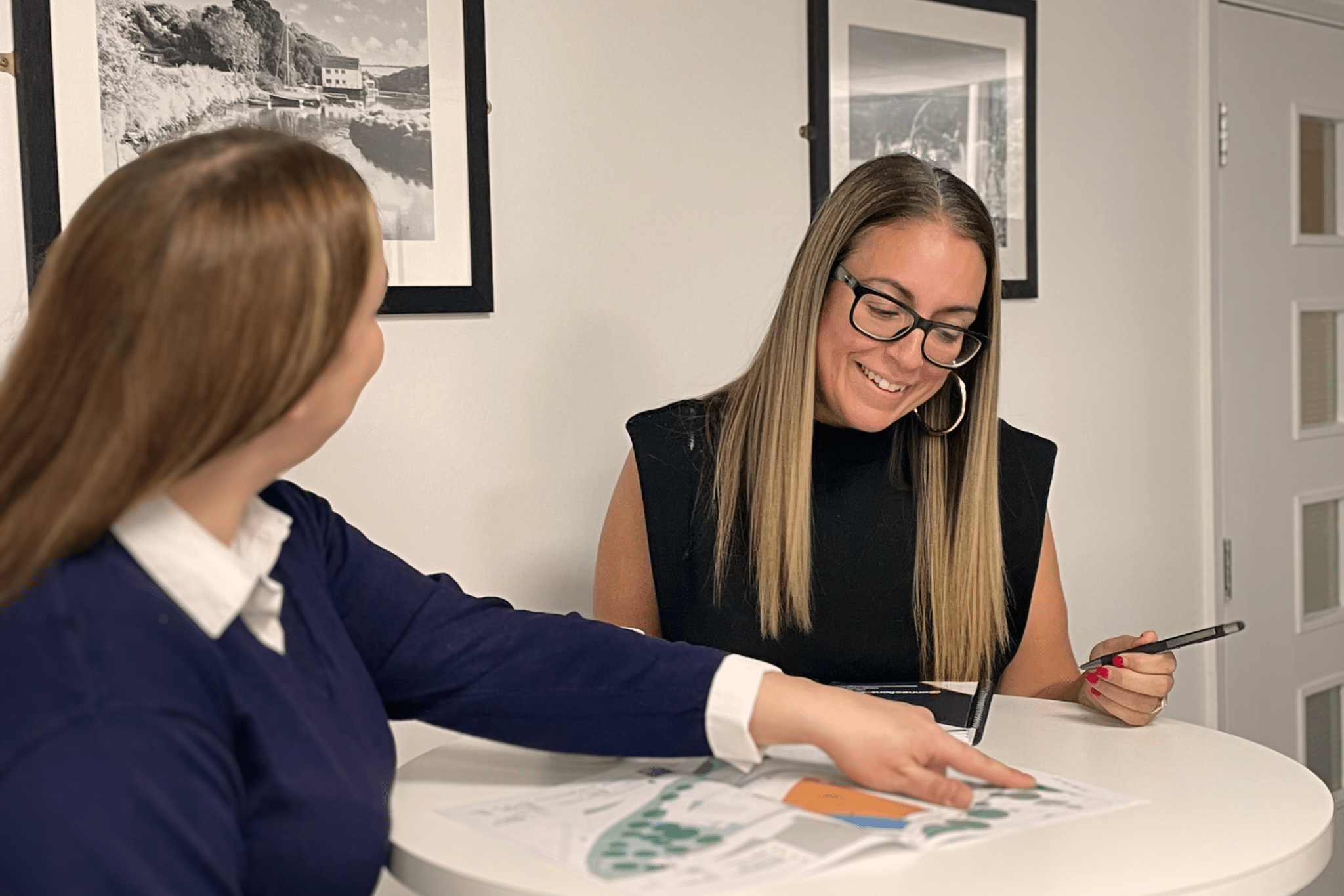 Women Discussing Utility Plans