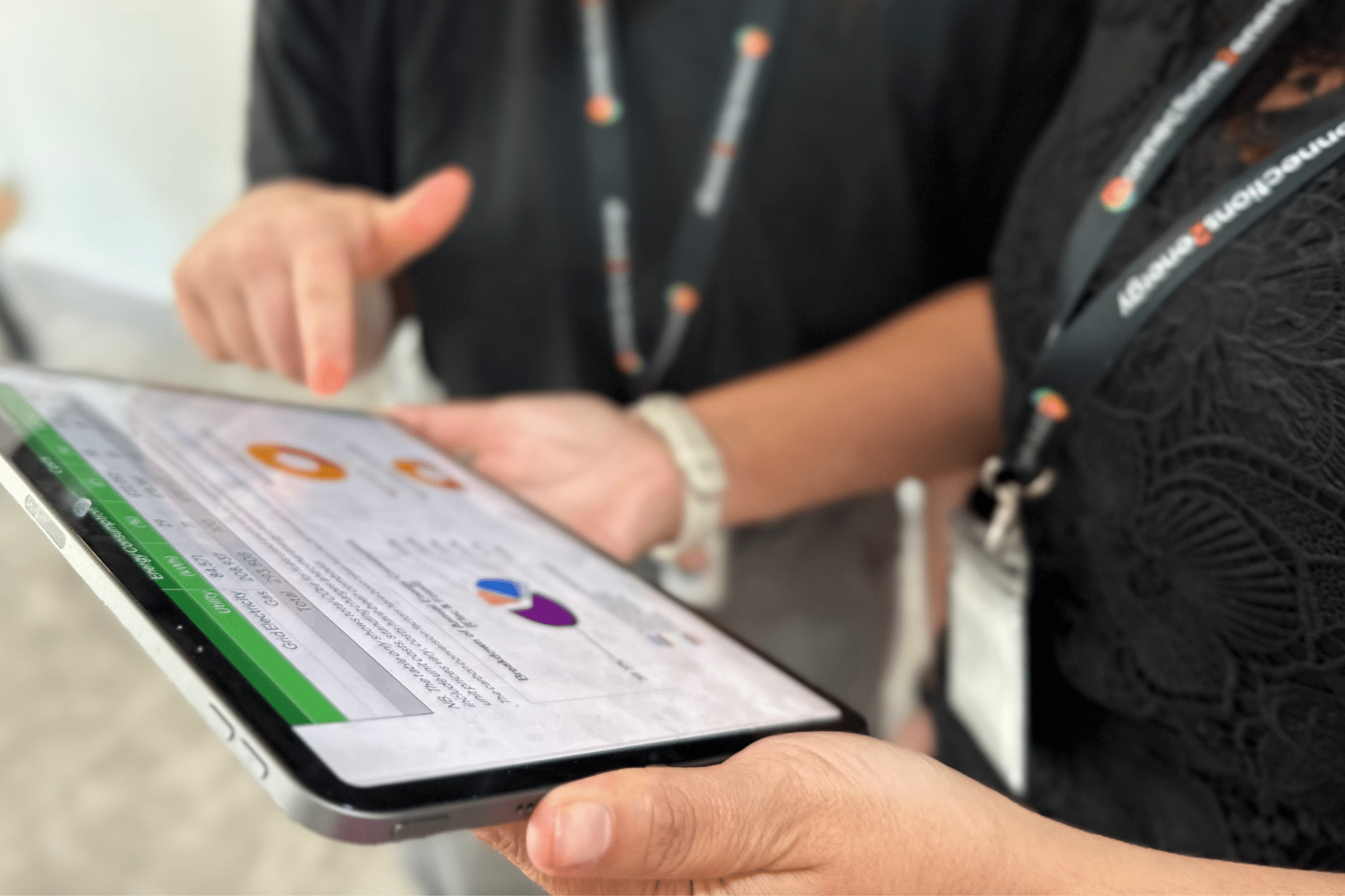 women looking at audit on ipad