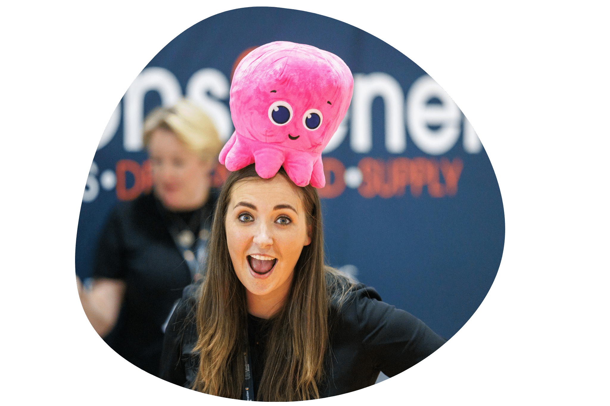 Connections2energy team member at a event wearing a fun hat, showing the company's community spirit