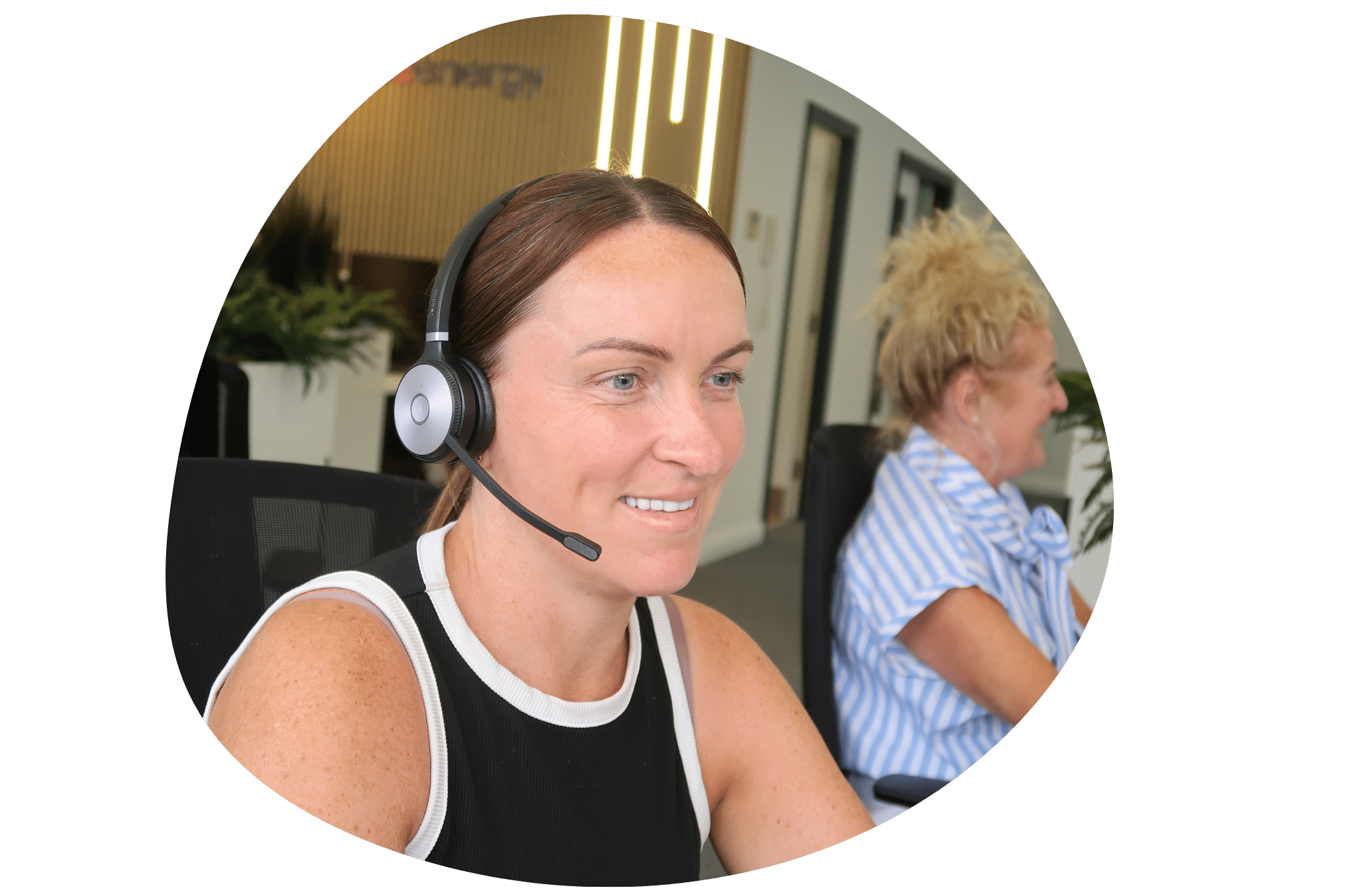 Connections2energy account manager on a client call at the office, providing dedicated utility project support